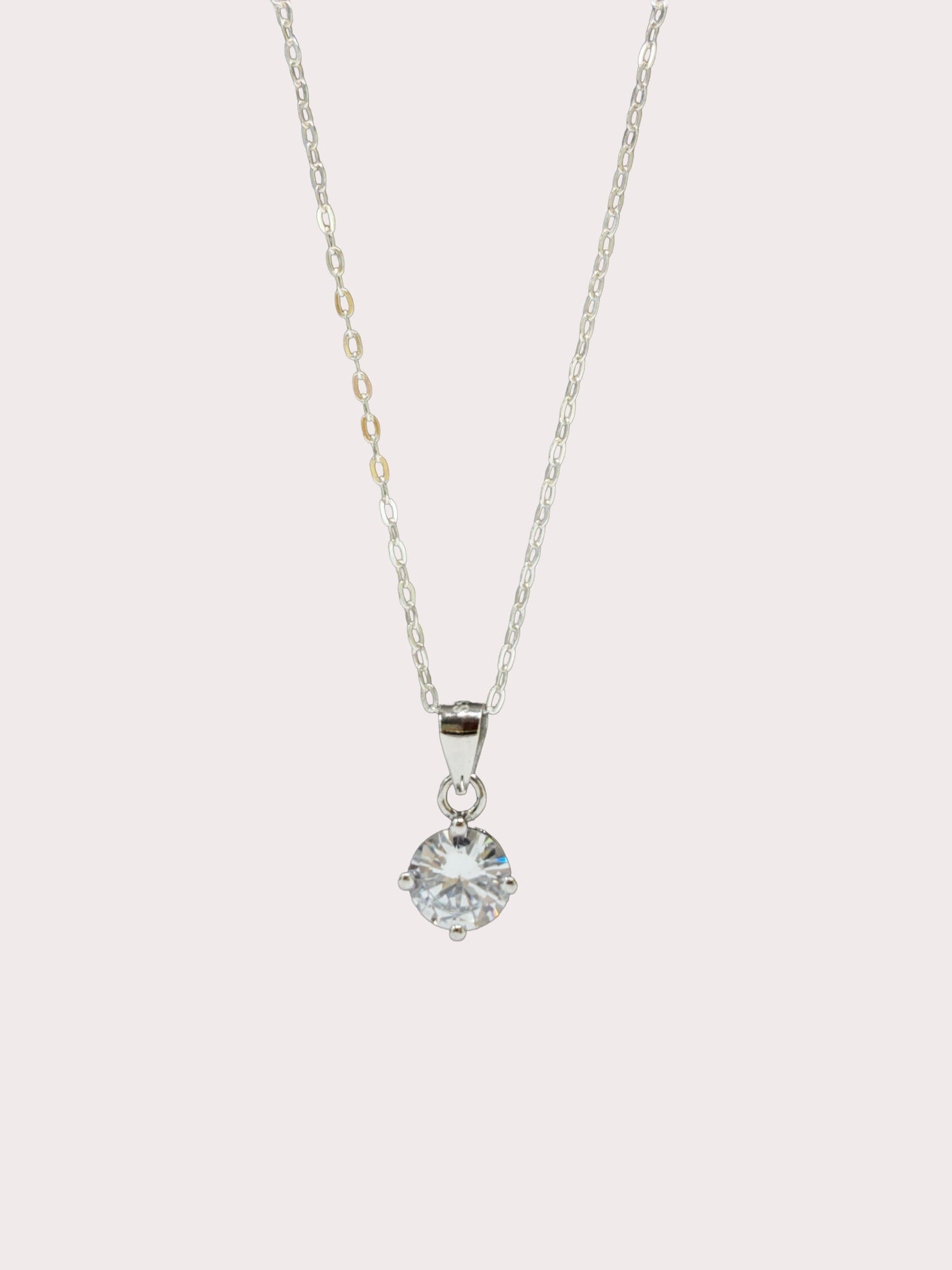 Sterling Silver Round Four Claw CZ Pendant