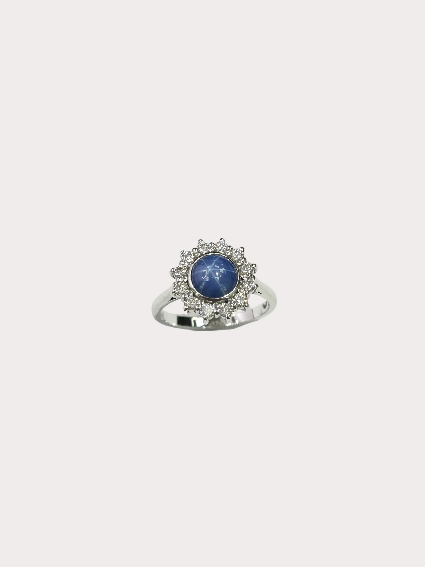 18ct White Gold Star Sapphire And Diamond Halo Ring