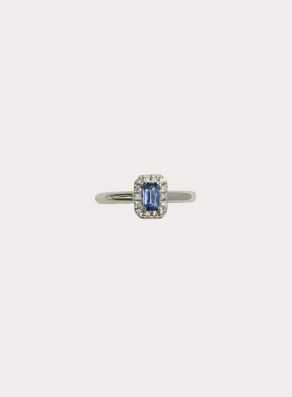 18ct White Gold Emerald Cut Sapphire and Diamond Halo