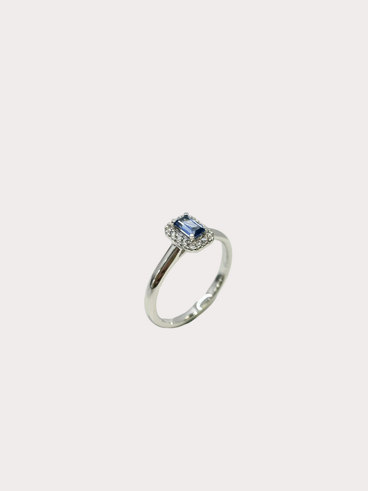 18ct White Gold Emerald Cut Sapphire and Diamond Halo